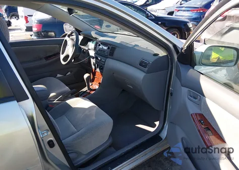 2003 Toyota Corolla Le z USA, uszkodzony, nr VIN JTDBR32E032004096